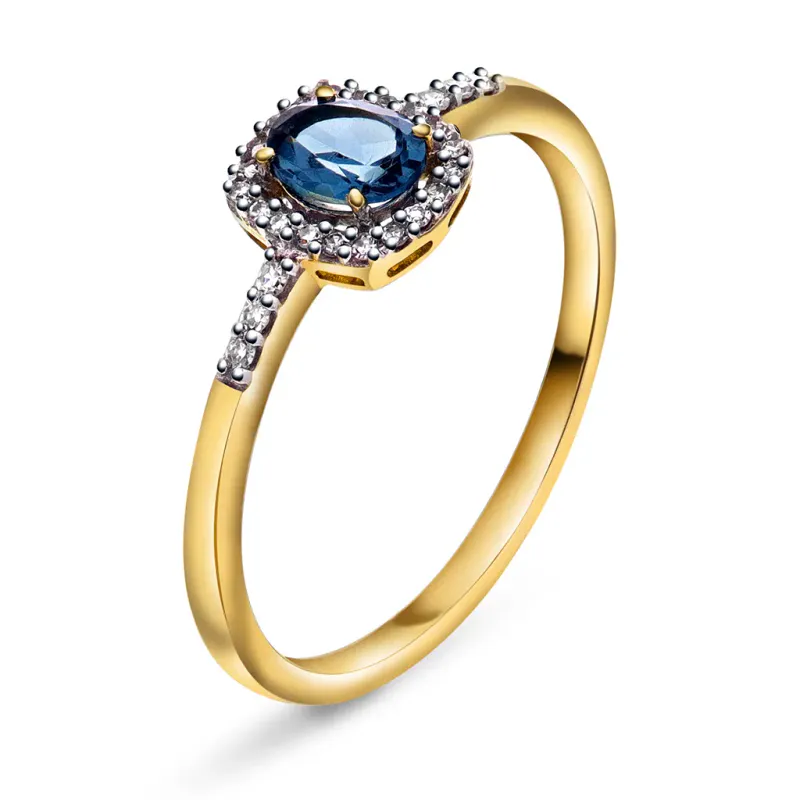 Ring i gull med diamanter og blå topaz